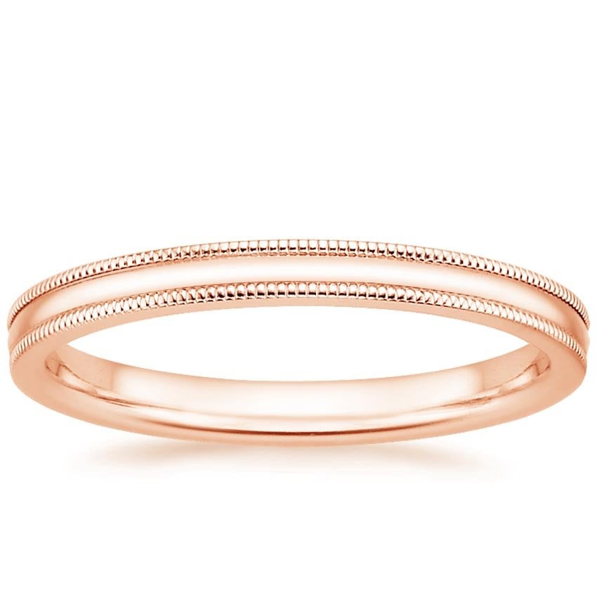 Rose gold diamond engagement ring with surprise diamond details