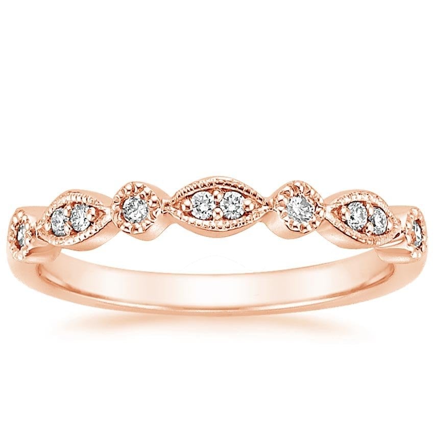 Rose gold diamond engagement ring with surprise diamond details