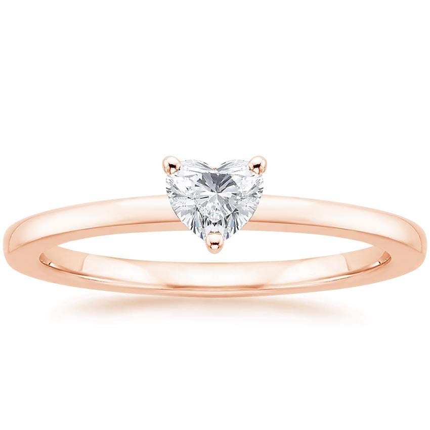 Rose gold diamond engagement ring with surprise diamond details