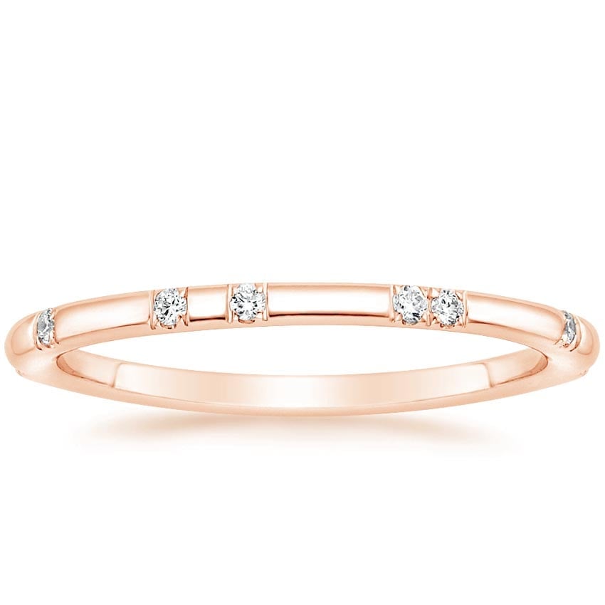 Rose gold diamond engagement ring with surprise diamond details