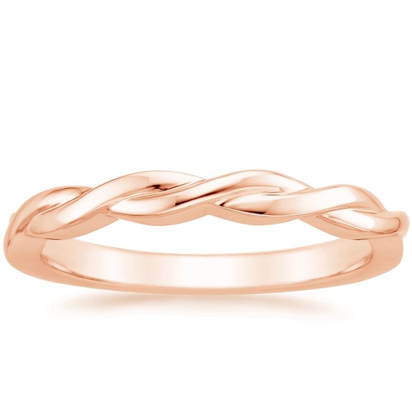 Rose gold diamond engagement ring with surprise diamond details