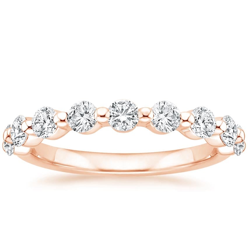 Rose gold diamond engagement ring with surprise diamond details