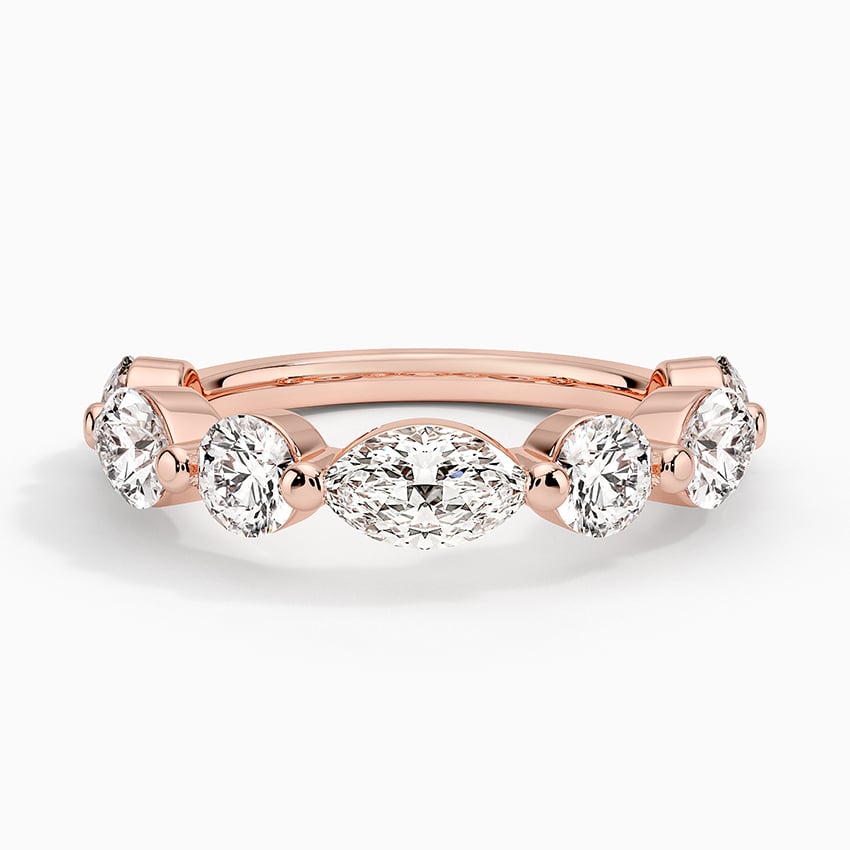 Rose gold diamond engagement ring with surprise diamond details