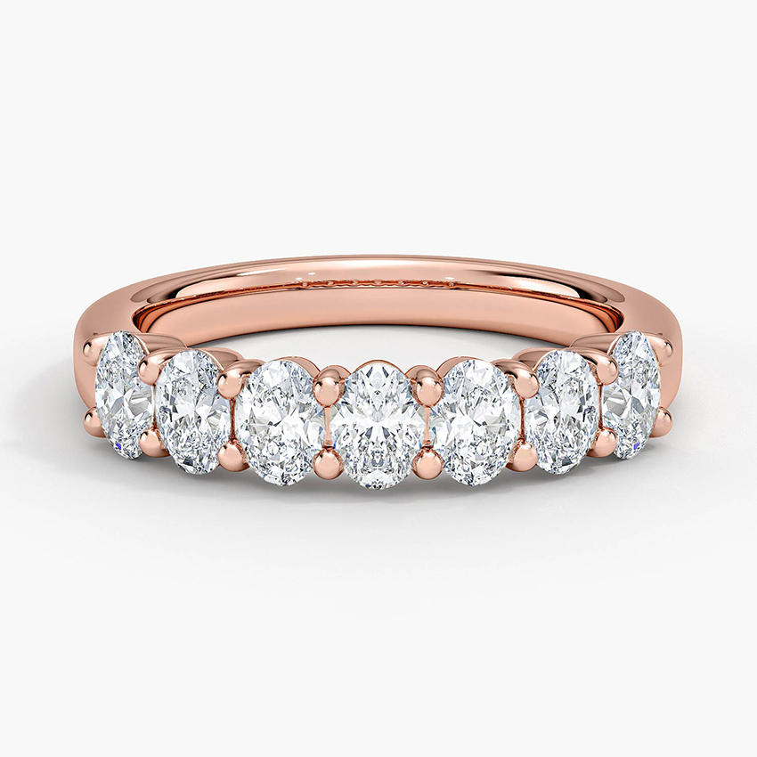 Rose gold diamond engagement ring with surprise diamond details