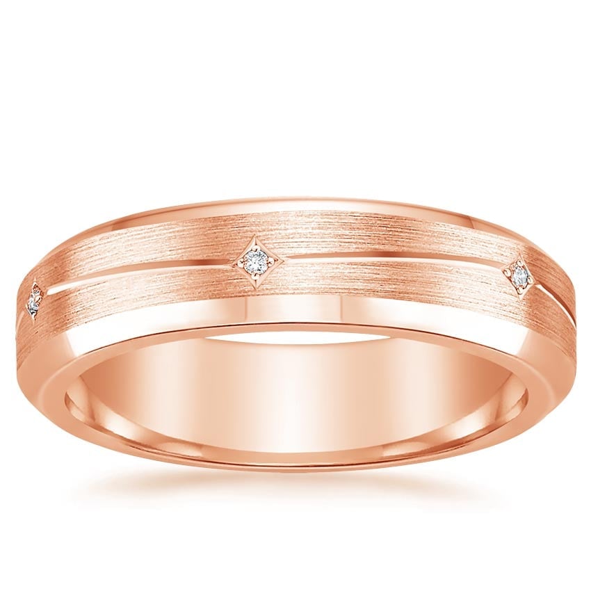 Rose gold diamond engagement ring with surprise diamond details