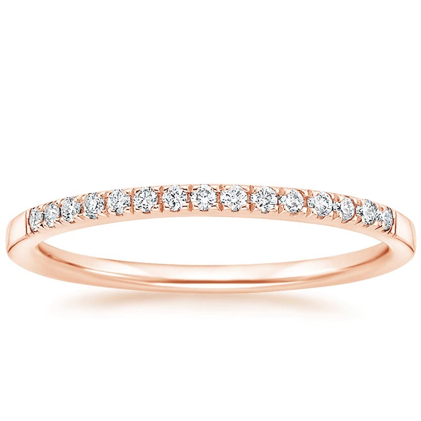 Rose gold diamond engagement ring with surprise diamond details