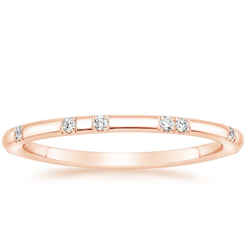 Rose gold diamond engagement ring with surprise diamond details