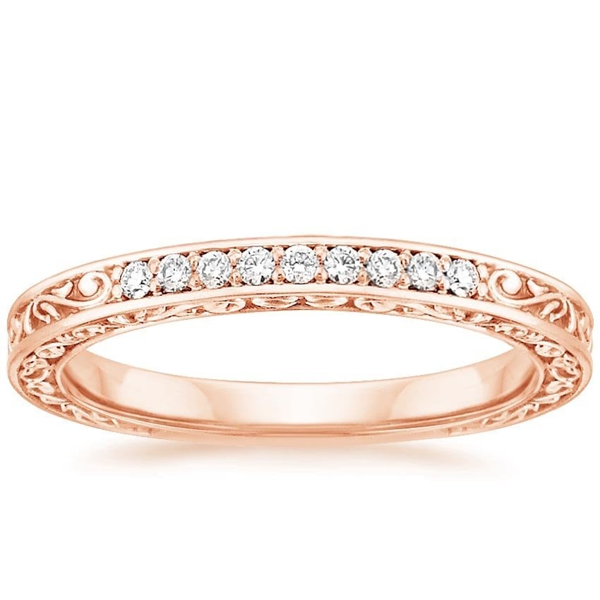 Rose gold diamond engagement ring with surprise diamond details