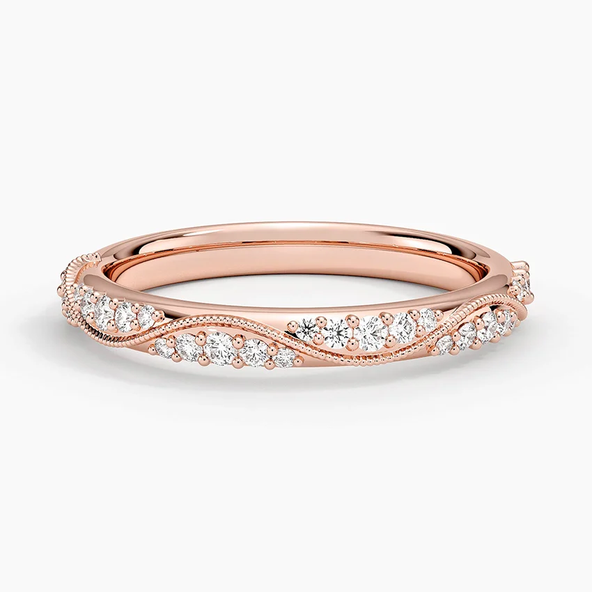 Rose gold diamond engagement ring with surprise diamond details