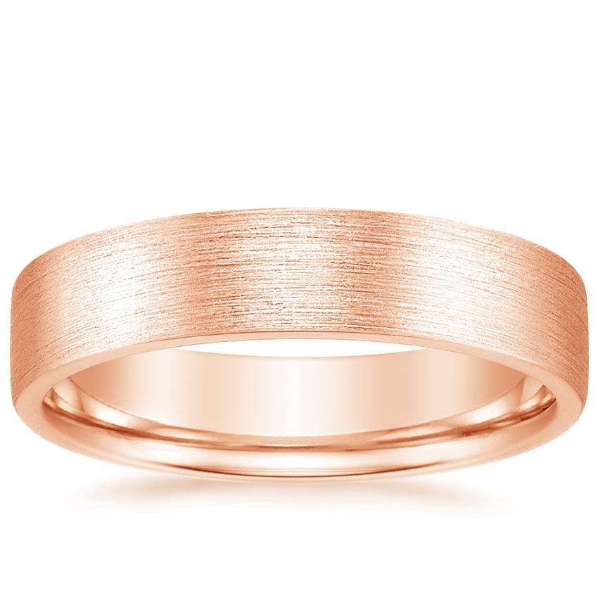 Rose gold diamond engagement ring with surprise diamond details