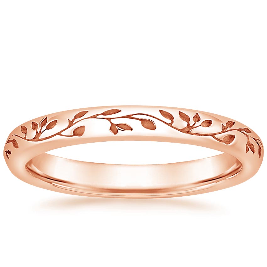 Rose gold diamond engagement ring with surprise diamond details