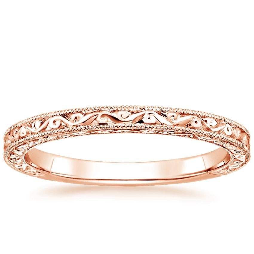 Rose gold diamond engagement ring with surprise diamond details