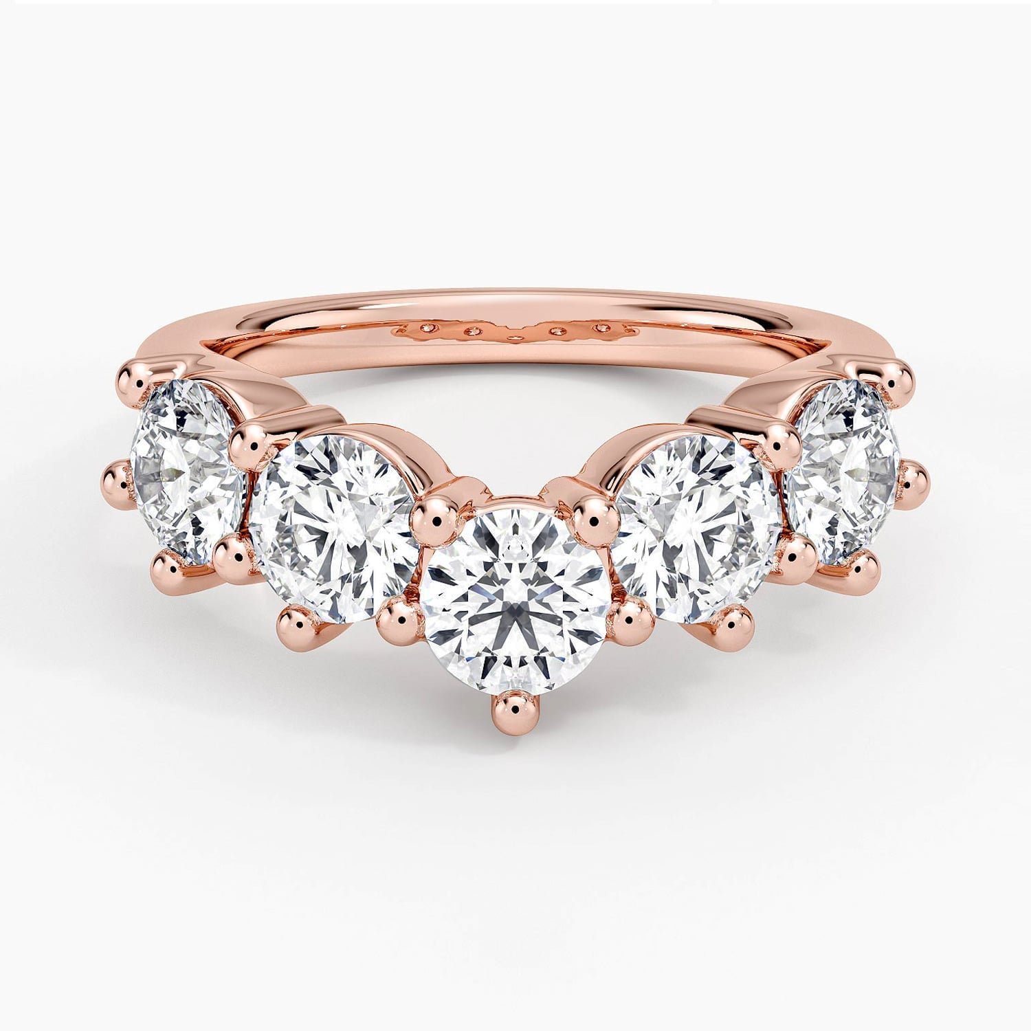 Rose gold diamond engagement ring with surprise diamond details