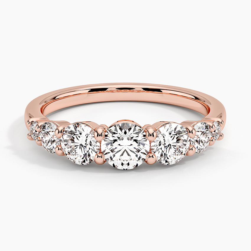 Rose gold diamond engagement ring with surprise diamond details
