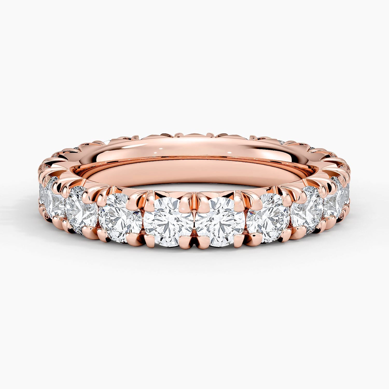 Rose gold diamond engagement ring with surprise diamond details