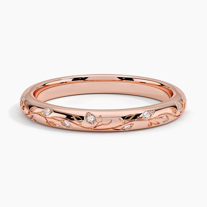 Rose gold diamond engagement ring with surprise diamond details