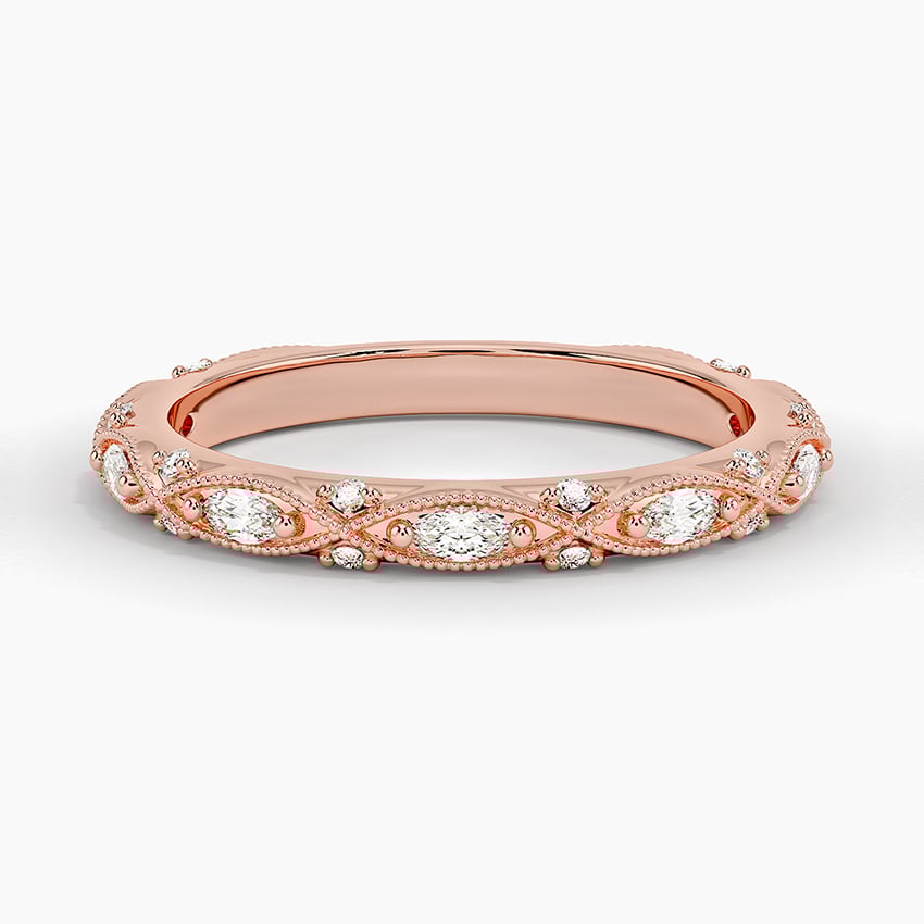 Rose gold diamond engagement ring with surprise diamond details