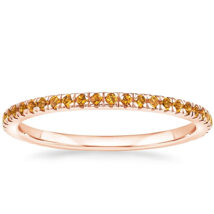 Rose gold diamond engagement ring with surprise diamond details