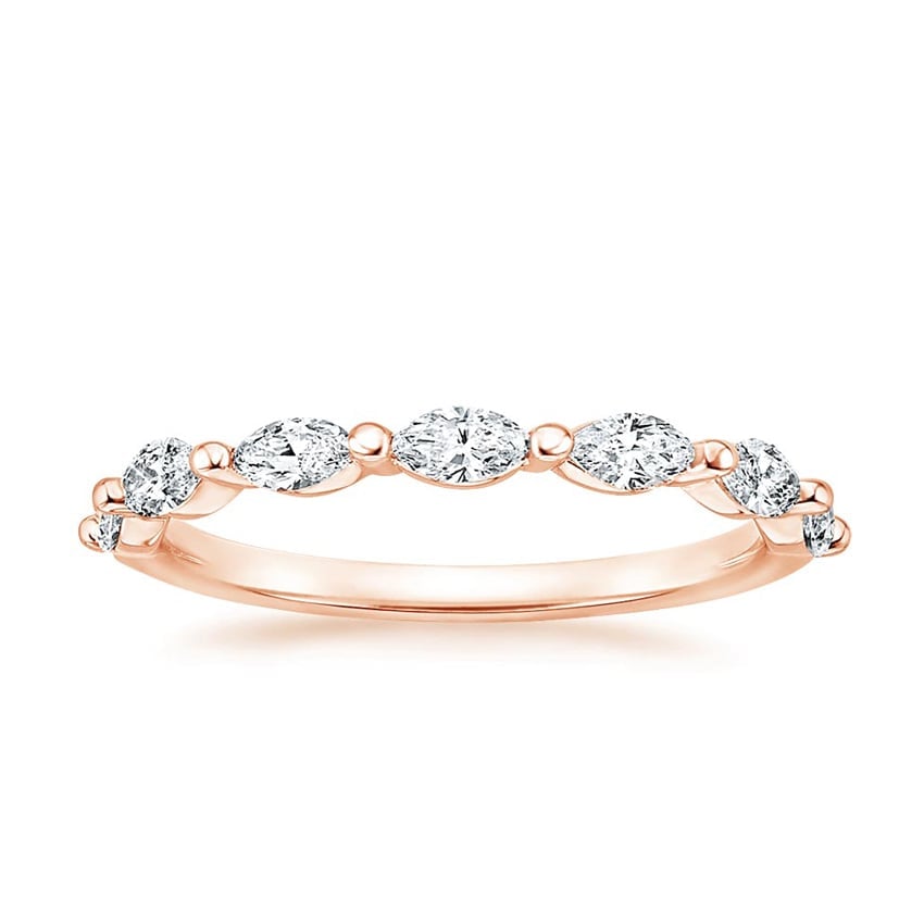 Rose gold diamond engagement ring with surprise diamond details