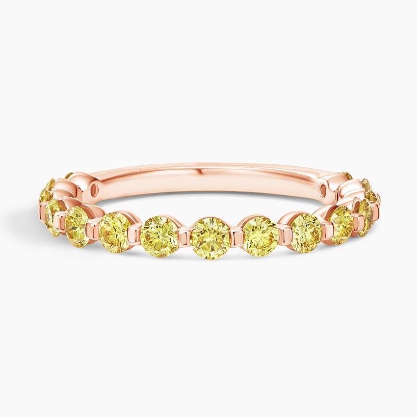 Rose gold diamond engagement ring with surprise diamond details