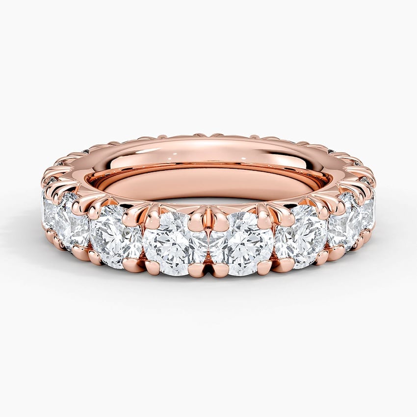 Rose gold diamond engagement ring with surprise diamond details