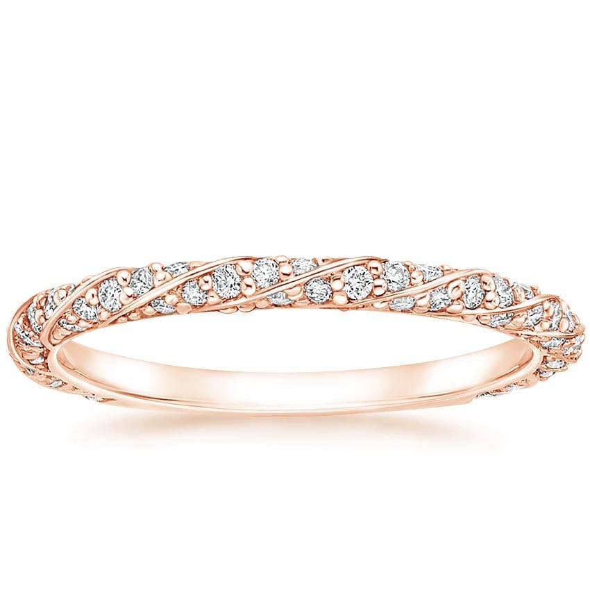 Rose gold diamond engagement ring with surprise diamond details