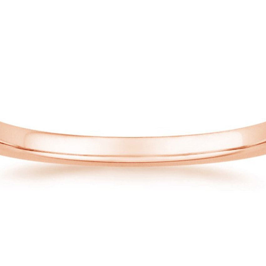 Rose gold diamond engagement ring with surprise diamond details