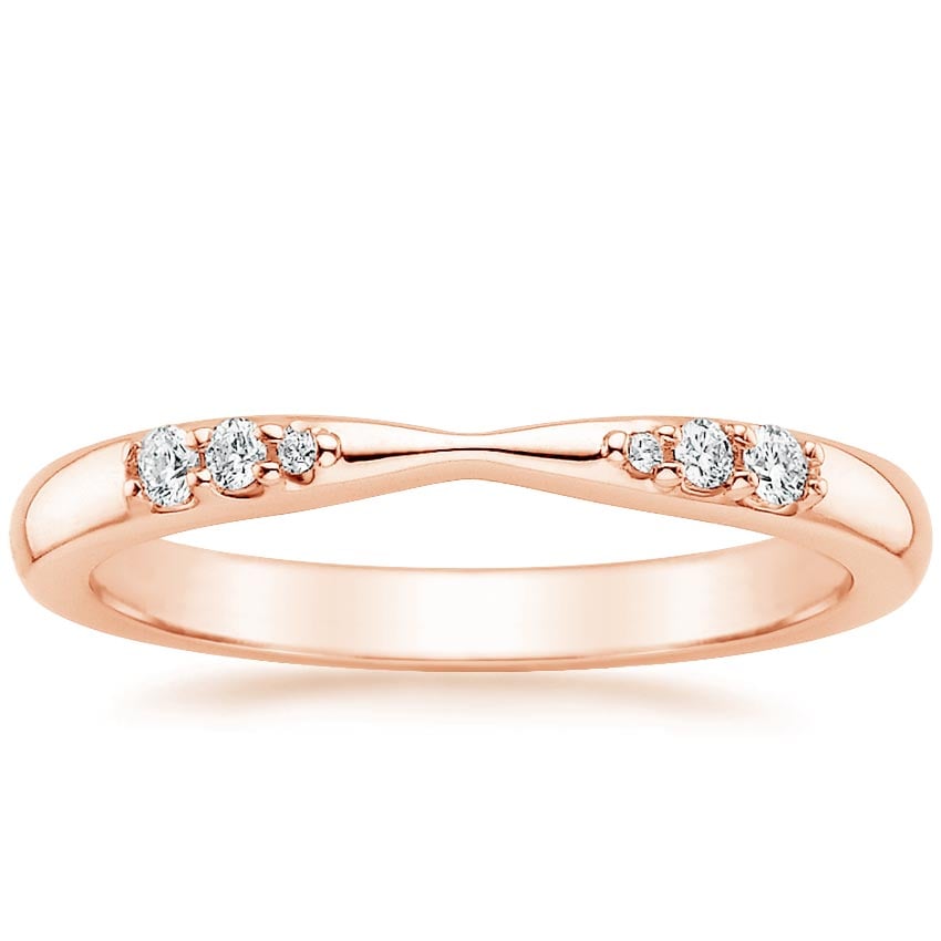Rose gold diamond engagement ring with surprise diamond details