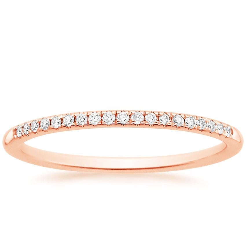 Rose gold diamond engagement ring with surprise diamond details