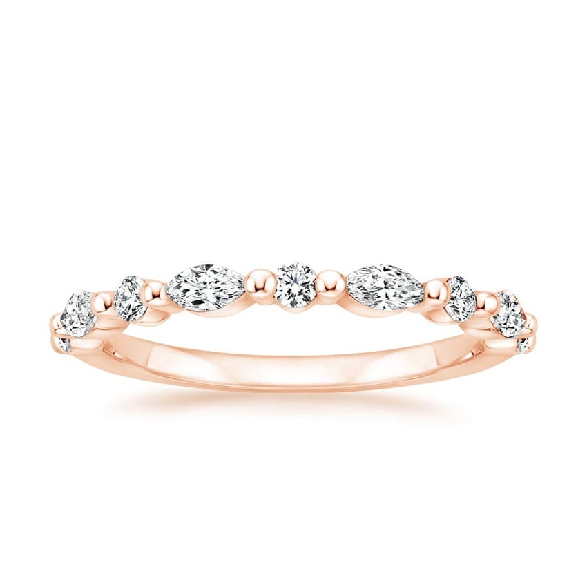 Rose gold diamond engagement ring with surprise diamond details