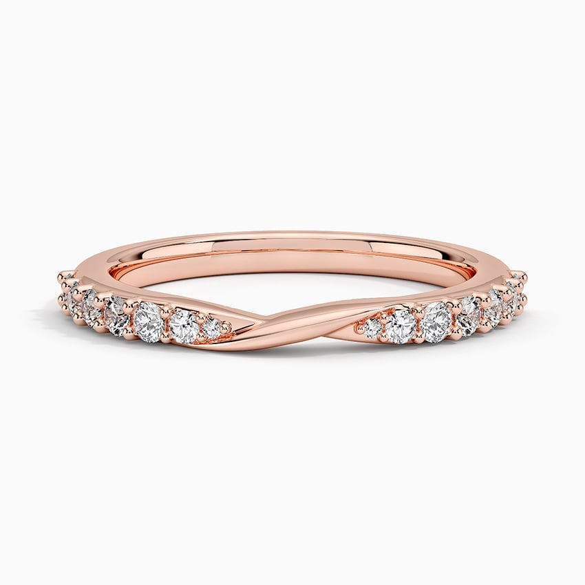 Rose gold diamond engagement ring with surprise diamond details