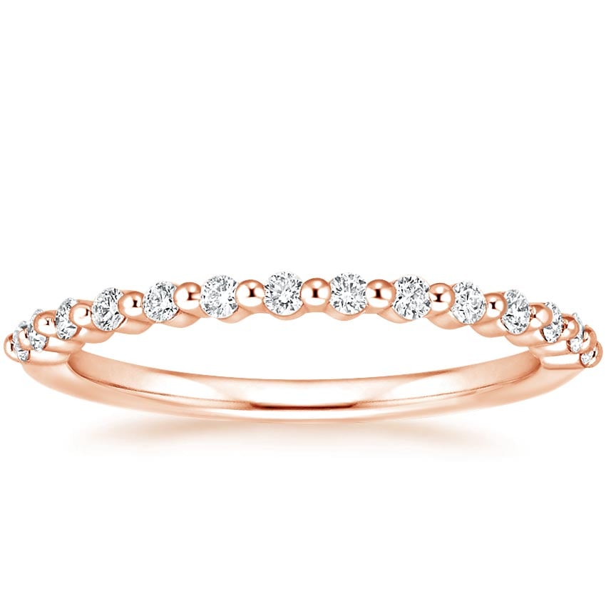 Rose gold diamond engagement ring with surprise diamond details