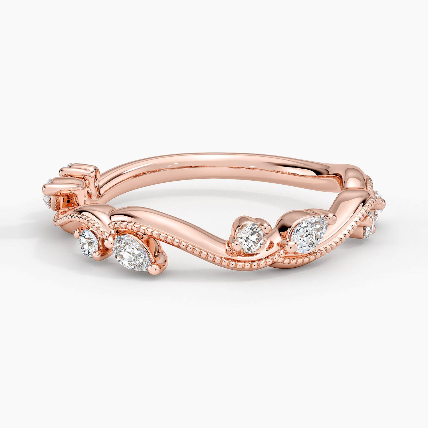 Rose gold diamond engagement ring with surprise diamond details