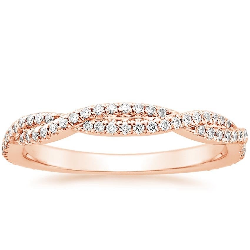 Rose gold diamond engagement ring with surprise diamond details