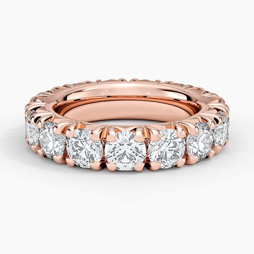 Rose gold diamond engagement ring with surprise diamond details