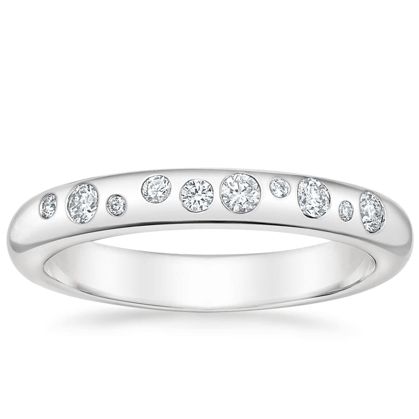 Rose gold diamond engagement ring with surprise diamond details