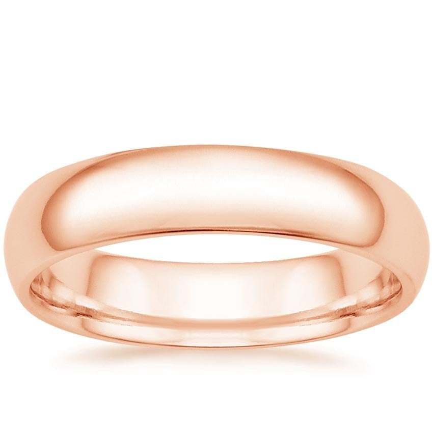Rose gold diamond engagement ring with surprise diamond details