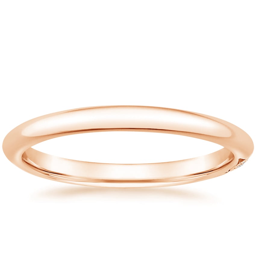 Rose gold diamond engagement ring with surprise diamond details