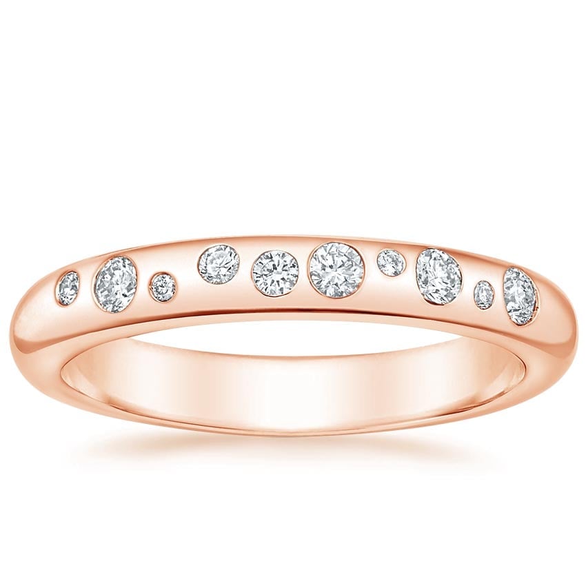 Rose gold diamond engagement ring with surprise diamond details