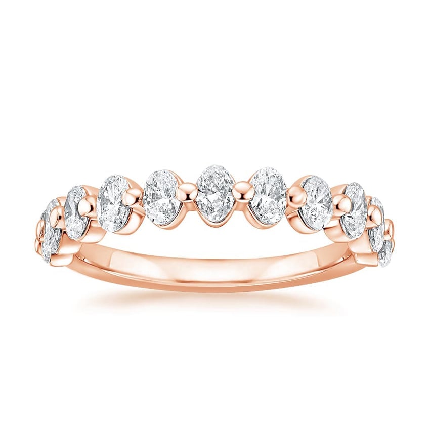 Rose gold diamond engagement ring with surprise diamond details
