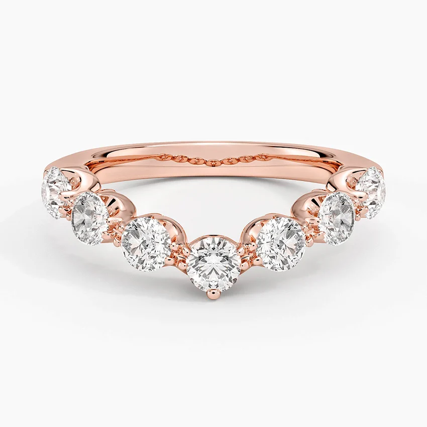 Rose gold diamond engagement ring with surprise diamond details