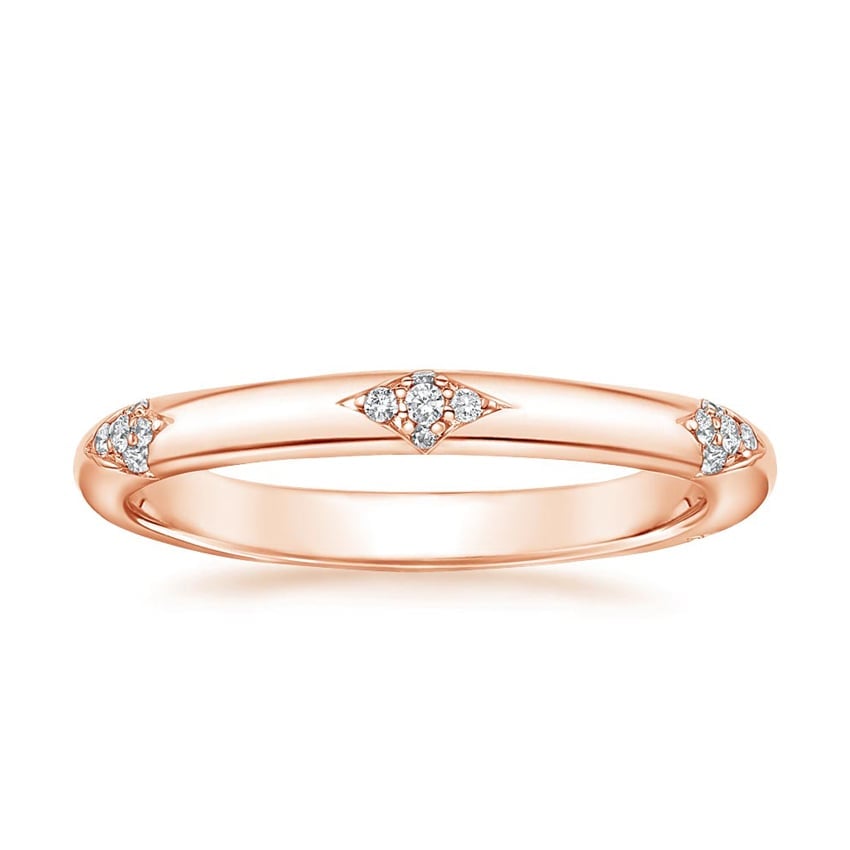 Rose gold diamond engagement ring with surprise diamond details