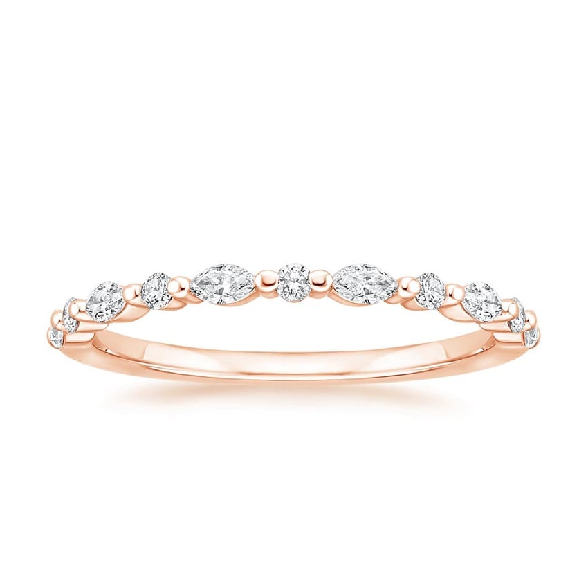 Rose gold diamond engagement ring with surprise diamond details