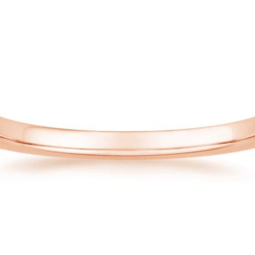 Rose gold diamond engagement ring with surprise diamond details