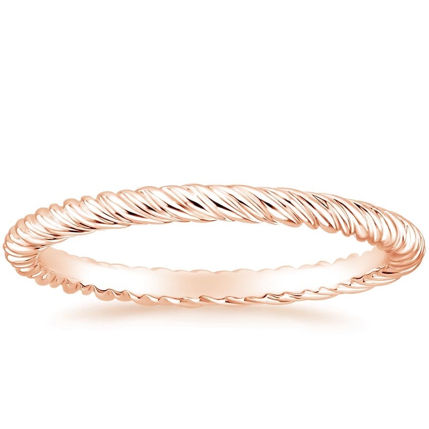 Rose gold diamond engagement ring with surprise diamond details