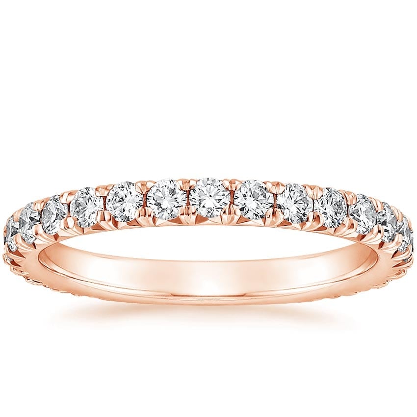 Rose gold diamond engagement ring with surprise diamond details