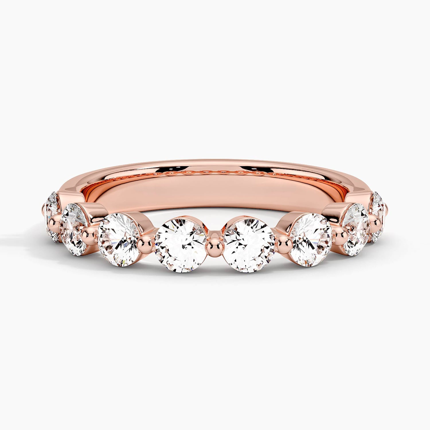Rose gold diamond engagement ring with surprise diamond details