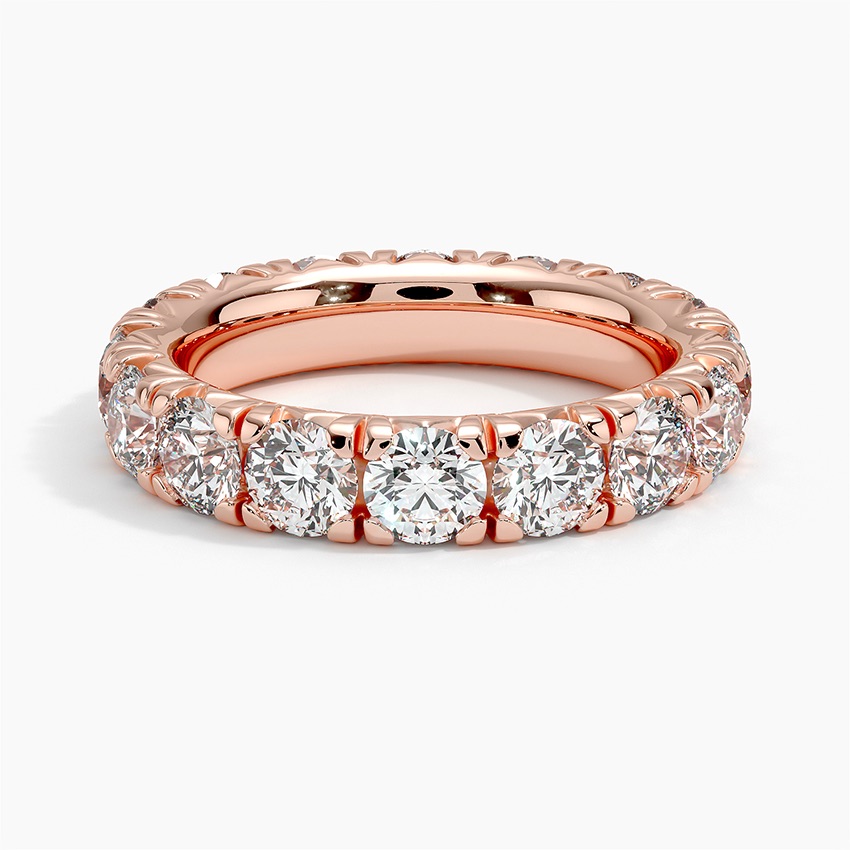 Rose gold diamond engagement ring with surprise diamond details