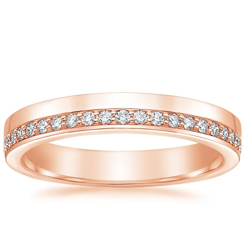 Rose gold diamond engagement ring with surprise diamond details