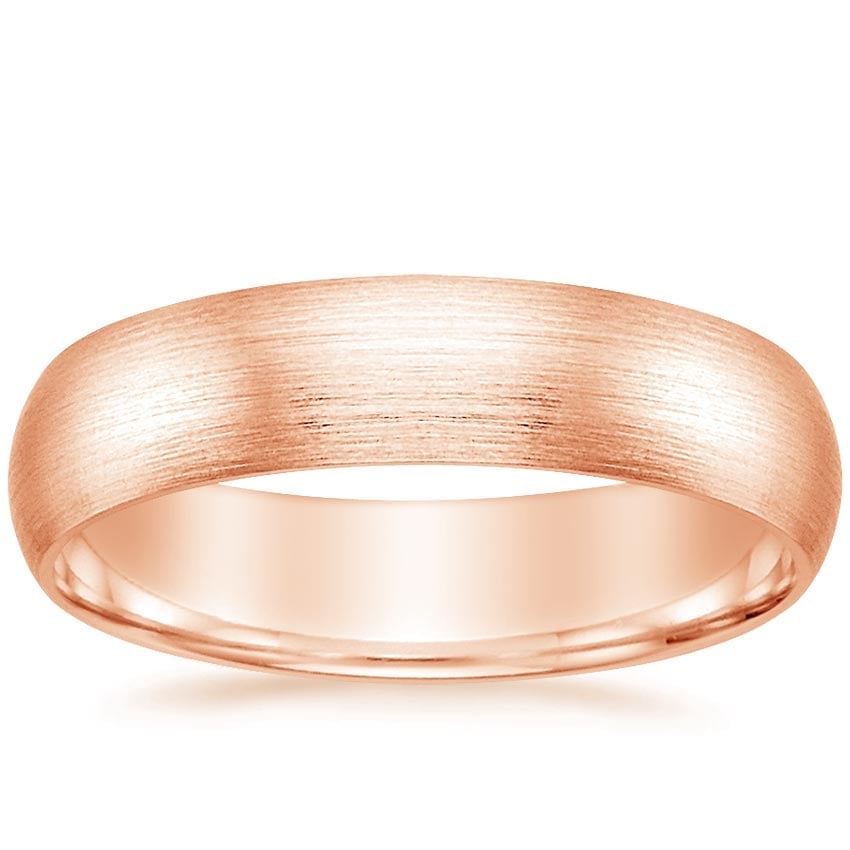 Rose gold diamond engagement ring with surprise diamond details